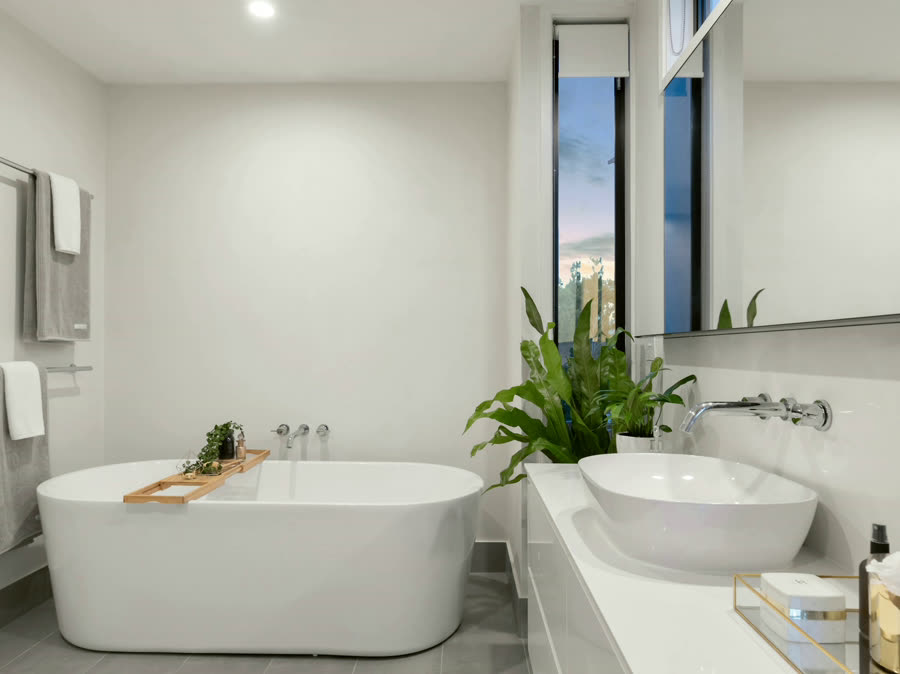 Zellige Main Bath, a bright tiled bathroom with a freestanding tub